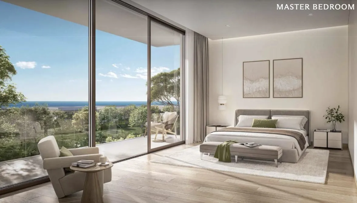 Bayn villa master bedroom with sea view — official ORA brochure render